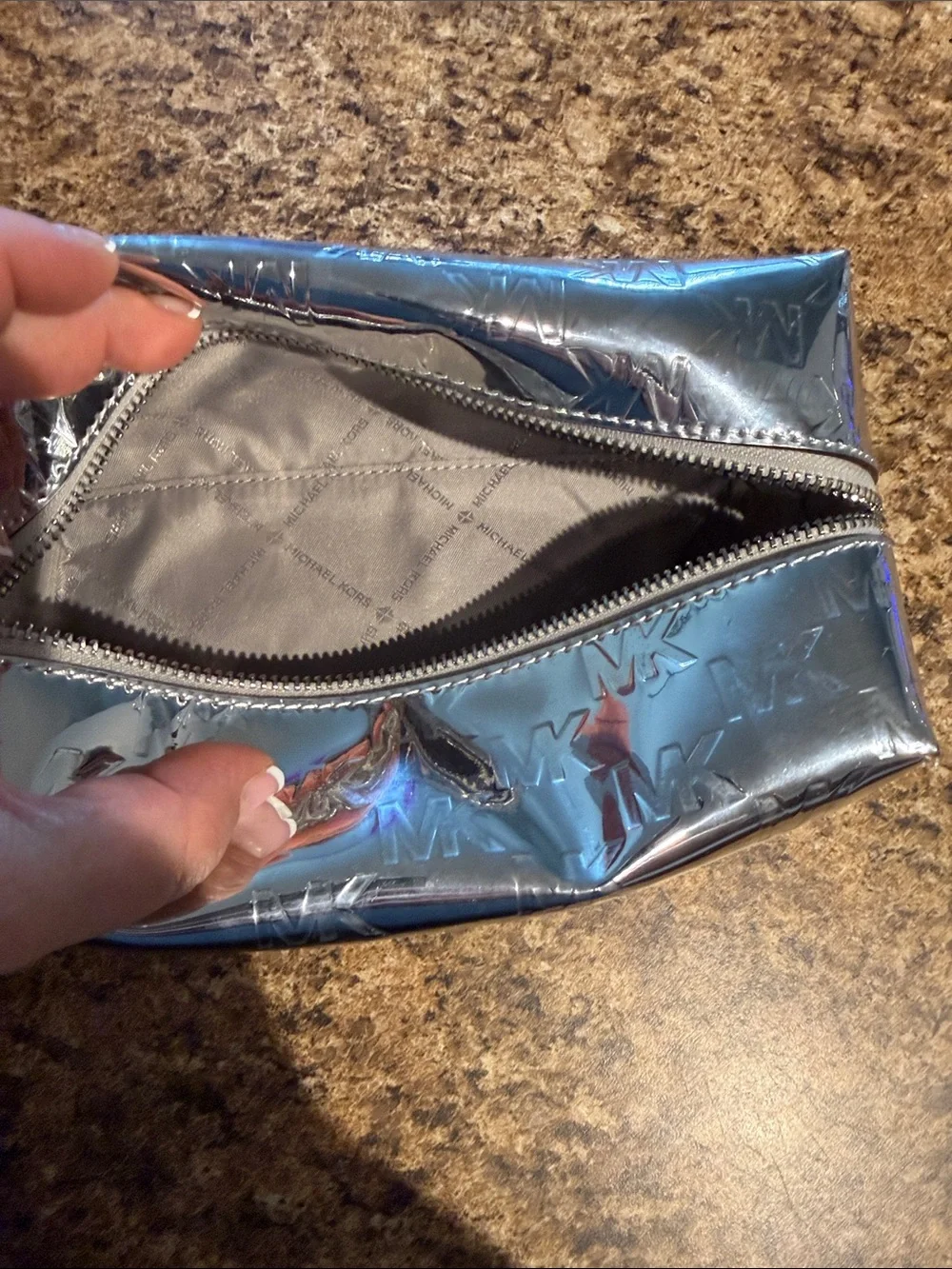 Michael Kors Metallic Silver MK Embossed Cosmetic Case